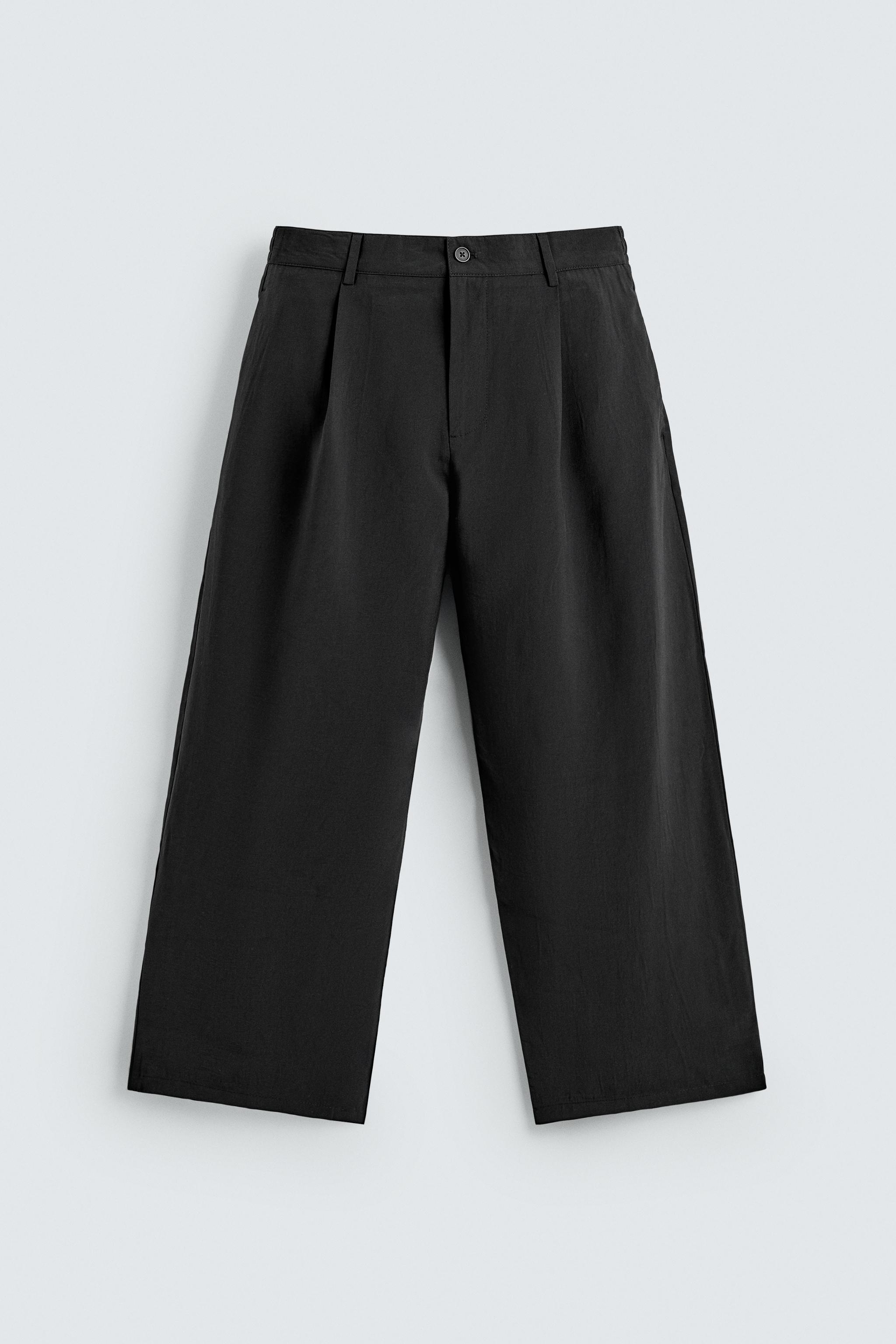 FLOWY PLEATED PANTS